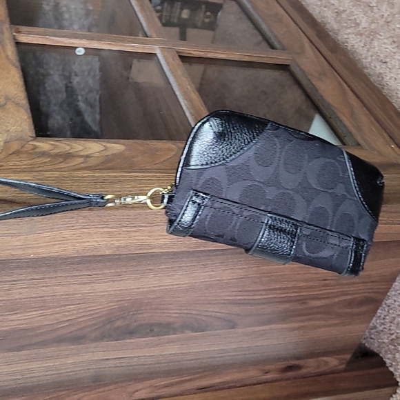 - Coach wristlet black super cute large enough for phone. - Picture 8 of 16